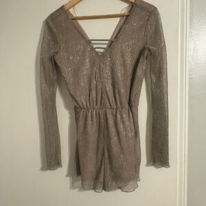 Sparkly gold long sleeve romper